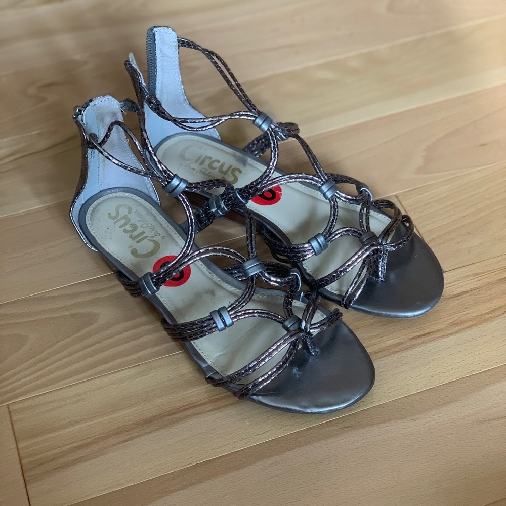 Silver strappy gladiator style sandals.